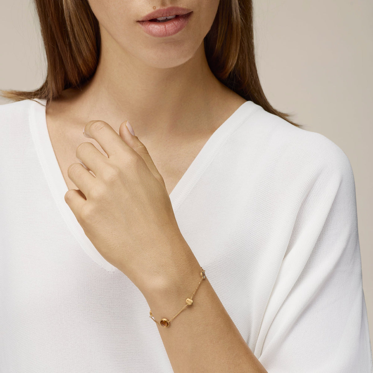 BRACCIALE ORO GIALLO E PIETRE NATURALI