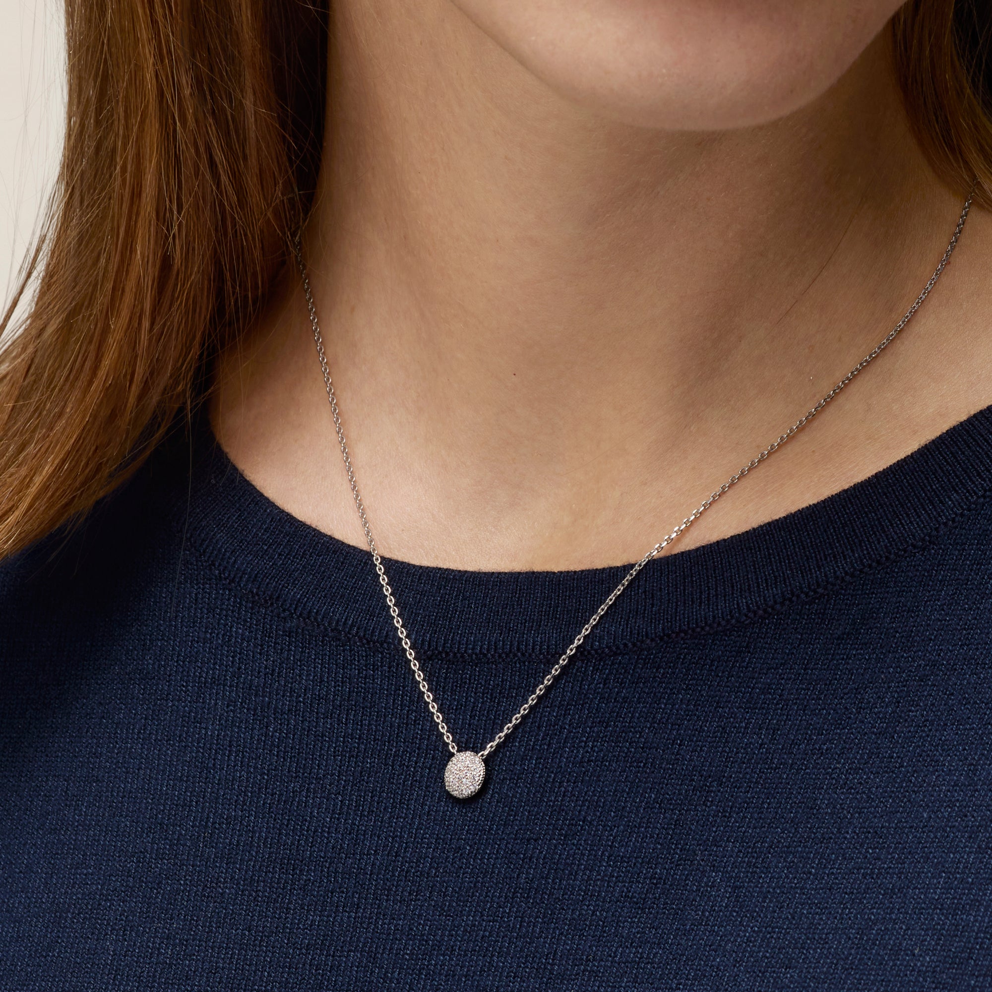 SMALL WHITE GOLD PENDANT NECKLACE WITH ROUND ELEMENT AND DIAMONDS