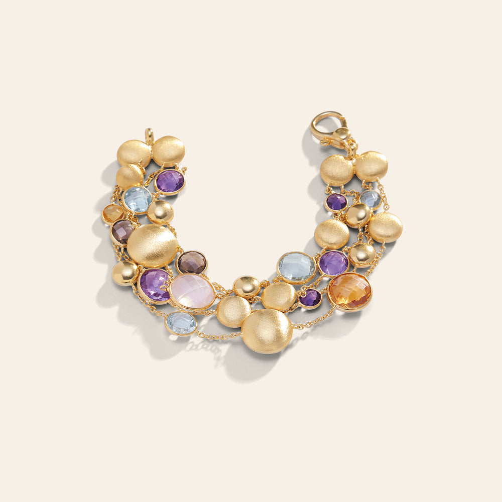 MULTI-STRAND YELLOW GOLD BRACELET WITH MIXED NATURAL STONES