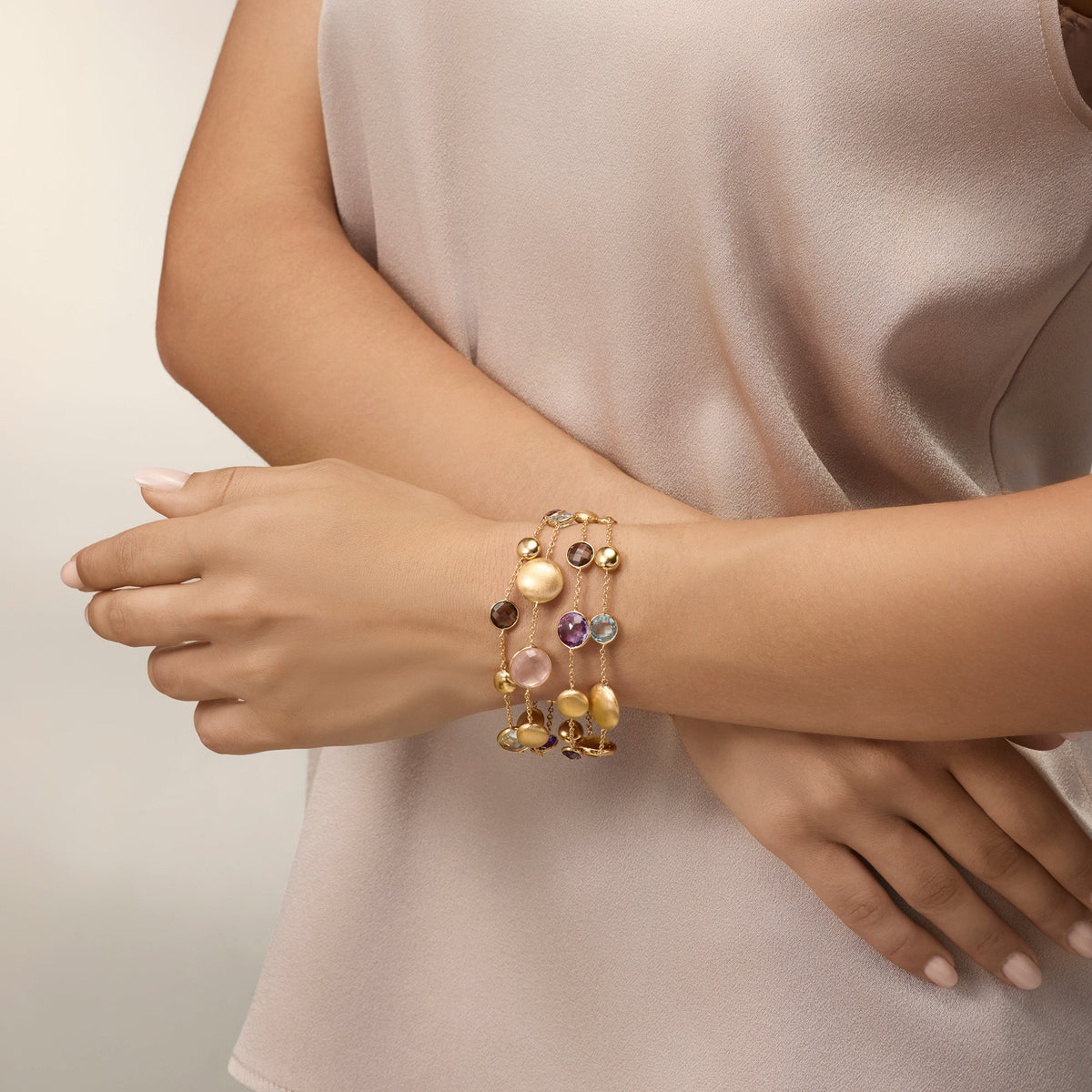 MULTI-STRAND YELLOW GOLD BRACELET WITH MIXED NATURAL STONES