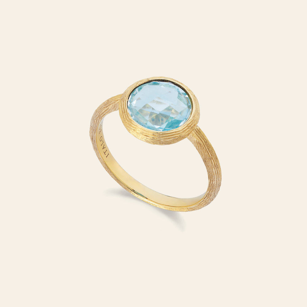 MEDIUM YELLOW GOLD RING WITH BLUE TOPAZ