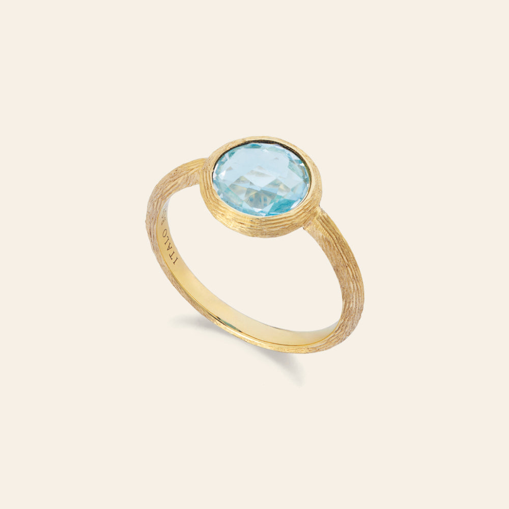 SMALL YELLOW GOLD RING WITH BLUE TOPAZ