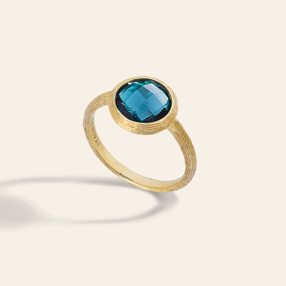 MEDIUM YELLOW GOLD RING WITH BLUE LONDON TOPAZ